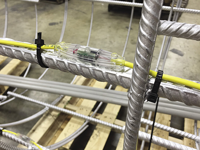 Thermal integrity profiler attached to rebar