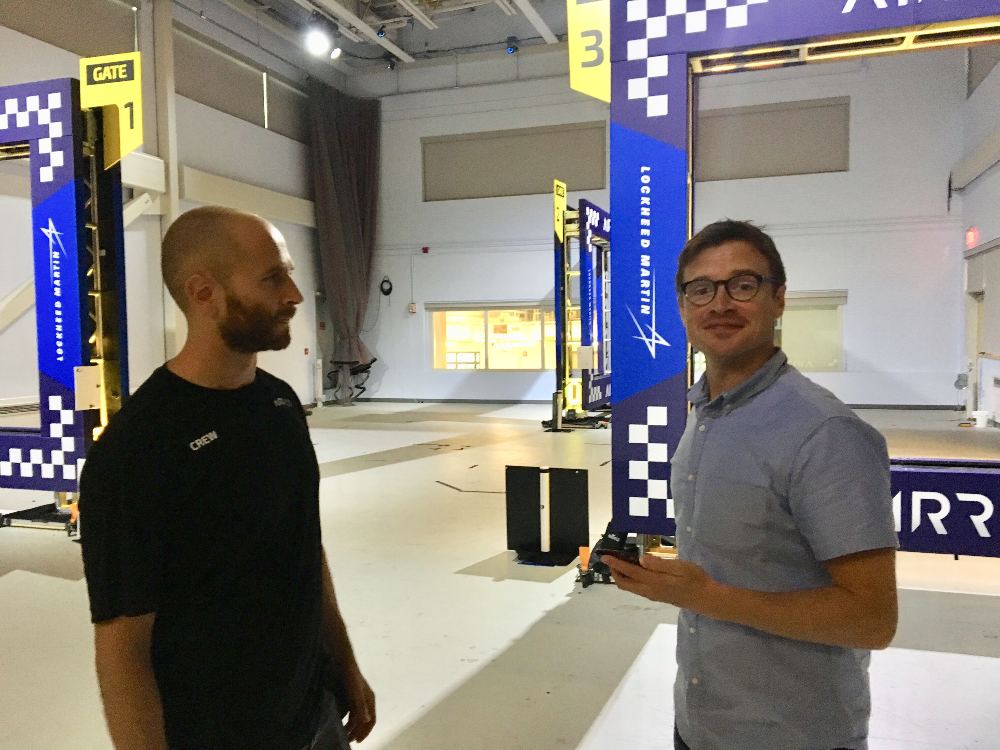 Tech Briefs editor Billy Hurley with the Drone Racing League's (DRL's) James Slider, at MIT, testing out autonomousdrones