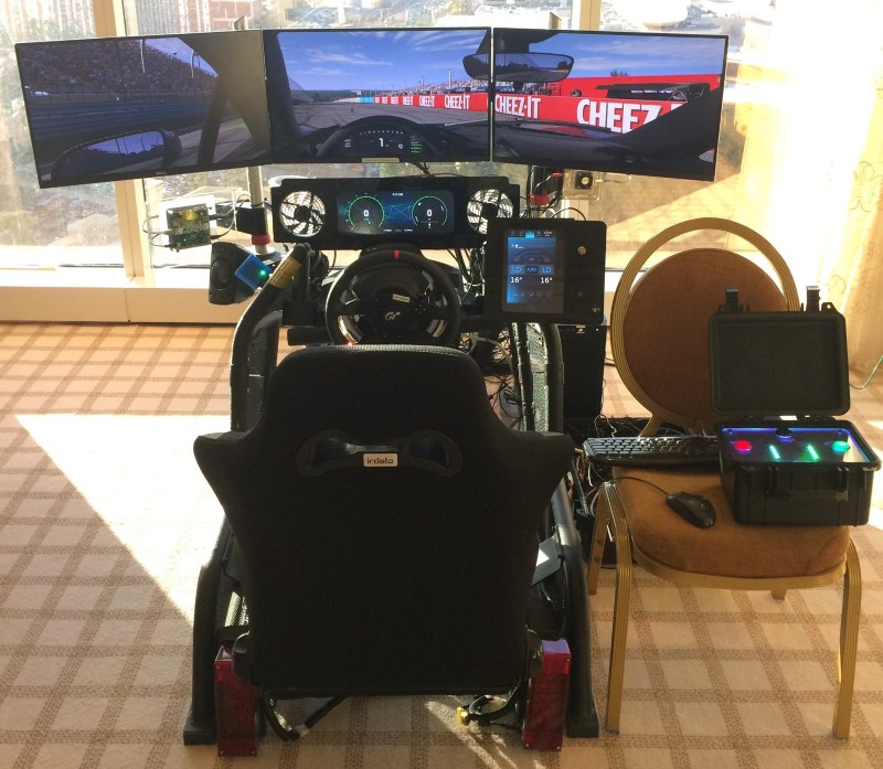 a demonstration of an Irdeto driving simulator at CES 2019 to show how a car can be hacked
